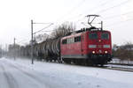 11. Dezember 2012, Gezogen von der Lok 151 036 fährt ein Kesselwagenzug bei Küps in Richtung Saalfeld.