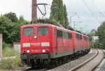 Die 151 069-2 zieht einen Lokzug bestehend aus 140 490, 140 495 und 140 037 von Aachen West durch Erkelenz am 23.07.2009