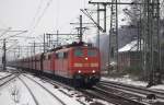 AK 151 100-5 und AK 151 110-4 poltern am 23.01.10 mit dem leeren  Beddinger  aus Salzgitter-Beddingen durch Hamburg-Harburg zum Hansaport in den Hamburger Hafen.