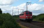 151 003-1 fuhr am 01.06.2012 als Lokzug von Emden nach Drpen, hier bei Veenhusen.