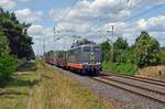 Mit einem Stahlzug am Haken rollt 162 010 (151 063) der Hectorrail am 16.07.23 durch Wittenberg-Labetz Richtung Falkenberg(E).