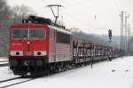 uerst seltener Gast auf der oberen Donautalbahn: 155 113-4 hat leichtes Spiel mit diesem leeren Autotransportzug. (Neuoffingen, 12.02.2010).