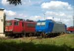 185 516 und 155 109 warten am 26.Juli 2011 im BW Engelsdorf auf ihren nchsten Einsatz.