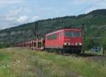 155 048 ist am 03.August 2011 mit einem leeren Autozug bei Thngersheim unterwegs.