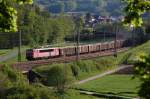 155 097-9 legt sich im Abendlicht des 13.05.12 mit GB 60722 Paderborn Gbf - Dornburg bei Himmighausen Bahnhof in die Kurve.