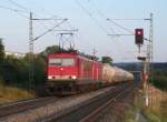 MEG 705 (155 196) und MEG 605 ziehen am 16.Juli 2013 einen Zementzug durch Gundelsdorf Richtung Saalfeld.