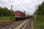 MEG 702 (155 179-5) Mitteldeutsche Eisenbahn GmbH mit einem Zementzug von Rüdersdorf nach Rostock-Seehafen, bei der Durchfahrt in Berlin-Hohenschönhausen.