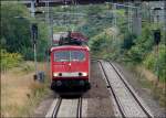 155 160-5 fhrt mit seinem Gterzug in den Hbf Stralsund ein.