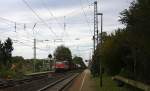 155 035-9 von Railion kommt als Umleiter mit einem gemischten Güterzug durch Kohlscheid aus Richtung Herzogenrath und fährt die Kohlscheider-Rampe hoch nach Aachen-West und weiter nach  Aachen-West.
Aufgenommen am 11.10.2014.
