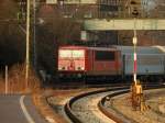 155 243-9 kam mit einen Militär Personenwagen und einen Güterzug durch den Bahnhof Minden in Richtung Süden gefahren.