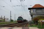 254 052 am 01.05.2010 mit Gterzug bei der AUsfahrt aus Piesteritz