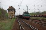 254 052 am 01.05.2010 mit Gterzug bei der Ausfahrt aus Rolau Gbf