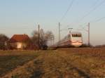 401 xxx fuhr am 09.03.15 im Sonnenuntergang durch Neu-Ulm.