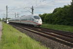 Ein Nachschuß auf den ICE Siegburg der mit dem 403 020-1 bei Nievenheim Kohnacker gen Köln fahrend zu sehen ist.