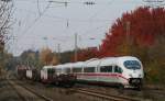 403 058-1  St.Ingbert  als ICE 722 (Mnchen Hbf-Essen Hbf) berholt  152 087-5 mit ihren Stahlzug in Dettelbach 31.10.09