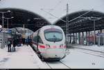 411 254-6 (Tz 1162  Vaihingen an der Enz ) als verspäteter ICE 1631 (Linie 15) von Frankfurt(Main)Hbf nach Berlin Gesundbrunnen steht bei Schneetreiben in Halle(Saale)Hbf abweichend auf Gleis 9.