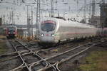 411 502(Neubrandenburg)als ICE 1676 von Kassel-Wilhelmshöhe nach Stralsund Hbf bei der Einfahrt im Rostocker Hbf links nährte sich still und heimlich eine DB-Regio