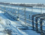 DB 411 xxx als ICE 1556 von Dresden Hbf nach Wiesbaden Hbf, am 13.02.2021 am Flughafen Leipzig/Halle.