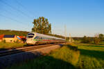 411 082 DB Fernverkehr  Mainz  mit einem unerkannt gebliebenen ICE bei Oberdachstetten Richtung Wrzburg, 13.06.2021