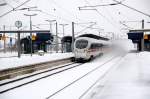 Ein ICE-T der BR 411 rauscht am 02.01.2010 durch Bitterfeld.