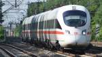 Ein ICE T mit dem Namen  Hansestadt Rostock  durchfhrt am 15.06.2012 den Bahnhof von Dreieich-Buchschlag.