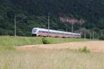 411 028-4  Reutlingen  ist am 24.06.2013 mit dem ICE 1627 nach Mnchen Hbf, hier zwischen Rudolstadt und Uhlstdt, unterwegs.