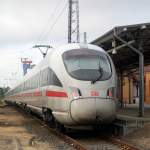 411 007-8 als ICE 1509 von Warnemnde nach Mnchen Hbf kurz vor der Ausfahrt im Bahnhof Warnemnde.13.07.2013