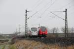 411 511-9  Hansestadt Wismar  trifft 442 308 bei Reundorf am 09.12.2014.