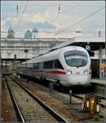 Der ICE-T 411 560-7  Tutzing  verlsst am 10.09.2010 den Bahnhof von Passau vor der Kulisse der Trme des Stephansdoms. (Jeanny)