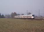 ICE 1611 nach Mnchen Hbf ist am 5. Mrz 2011 auf der Frankenwaldbahn bei Kronach unterwegs.