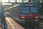 Am 21.06.2013 bestandt die S8 von Mainz nach Hanau aus der Einheit ET420 267-7 und einer weiteren Einheit. Hier ist die S-Bahn gerade bei der Einfahrt in den Bahnhof von Mainz-Bischofsheim.