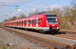 Bei der Einfahrt in den Bahnhof Korschenbroich ist hier der Triebwagen 422 034-9 als  S8/S5 nach Dortmund zusehen.......quasi ist es gleich high noon....an diesem Sonntag den 1. April 2012 