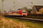 Hier führt der 422 512-4 einen S8 Zug nach Mönchengladbach, gerade hat er den Bahnsteig in Kleinenbroich verlassen. 18.2.2015