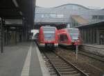 Hier links 423 033-0 als RB nach Berlin Ostbahnhof und rechts 646 020-8 als RB22 nach Schnefeld Flughafen, diese beiden Zge standen am 27.2.2010 in Potsdam Hbf.