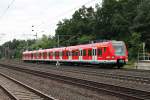 Einfahrt am 20.06.2014 von 423 830-9 in den Bahnhof von Neu Isenburg.