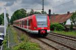 Einfahrt in Eitorf,  hier kommt der 423 046 als S12 nach Düren an den Bahnsteig herangefahren.