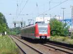 Nachschuss auf 423 955-4 der S-Bahn Rhein Main auf den Weg nach Köln.

Königswinter 29.06.2015