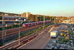 Nachschuss auf 426 004-8  Walhausen  und 425 814-1, die den Hp Oberesslingen auf Gleis 2 durchfahren.