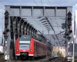 Quitschiebahn Nummer 227 der S-BahnRheinNeckar ist am 18.03.2008 als S3 Richtung Germersheim ber Ludwigshafen, Schifferstadt, Speyer bei Ludwigshafen-Mitte unterwegs.