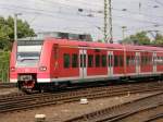 ET 425 032 fhrt in Kln Messe/Deutz auf die Hohenzollernbrcke in Richtung Hauptbahnhof.