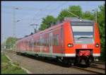 425 070 als  Rhein-Niers-Bahn  RB11075 nach Aachen am ehem. B km 28.899 20.4.2009