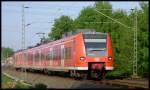 425 077 als  Rhein-Niers-Bahn  RB11077 nach Aachen am ehem. B km 28.899 20.4.2009