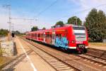 Mit Kriegsbemalung fhrt der 425 077 am Sonntagmittag aus dem Rheydter Hauptbahnhof in Richtung Aachen als RB33 aus.2.9.2012