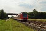 Ein umgeleiter RE11 Zug, der von dem 425 061-9 geführt wird ist hier kurz hinter der L361 Brücke bei Kleinenbroich abgelichtet auf seinem Weg nach Hamm.