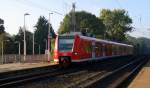 Die Rhein Niers Bahn (RB33) aus Aachen-Hbf-Heinsberg kommt aus Richtung Aachen-West,Laurensberg,Richterich, und fährt durch Kohlscheid und fährt in Richtung Herzogenrath.