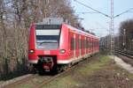 425 063/563 ist bei Sonnigem Wetter auf der Rhein-Niers-Bahn im Einsatz. Hier bei der Einfahrt von Hckelhoven-Baal, 16.02.2007