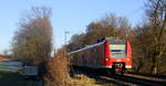 Die Rhein Niers Bahn (RB33) kommt aus Duisburg-Hbf nach Aachen-Hbf und kommt aus Richtung Mönchengladbach-Hbf,Rheydt-Hbf,Wickrath,Beckrath,Herrath,Erkelenz und fährt durch Baal in Richtung Hückelhoven-Baal,Brachelen,Lindern,Süggerrath,Geilenkirchen,Frelenberg,Zweibrüggen,Übach-Palenberg,Rimburg,Finkenrath,Hofstadt,Herzogenrath, Kohlscheid,Richterich,Laurensberg,Aachen-West,Aachen-Schanz,Aachen-Hbf. 
Aufgenommen von einem Weg Zwischen Erkelenz und Hückelhoven-Baal.
Bei Sonnenschein am Kalten  Mittag vom 29.12.2016.