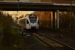 RE 13 bei der Druchfahrt in Korschenbroich, geführt wird der Zug vom Eurobahn ET 6.03 RRX der aus untergehenden Sonne kommt. 28.11.2014