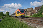 429 541 der Hessischen Landesbahn war am 20.05.2024 als HLB 24415 von Kassel nach Frankfurt unterwegs. Gerade wurde der Bahnhof Felsberg-Gensungen verlassen.