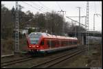 Br 429 mit dem RE9 aus Rostock Hbf nach Sassnitz kurz hinter Kassebohm am 01.04.09